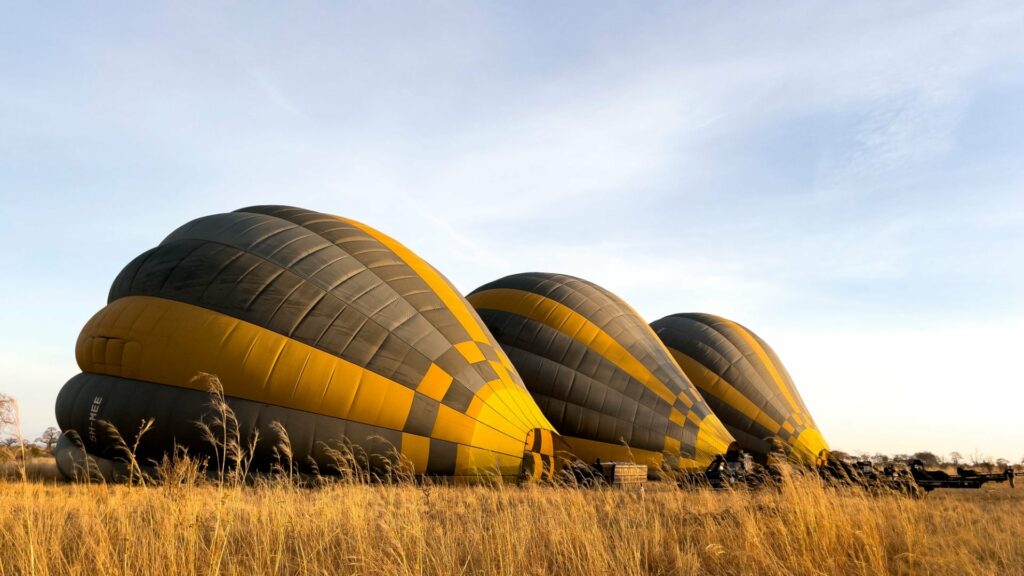 Three balloons inflating in Tarangire